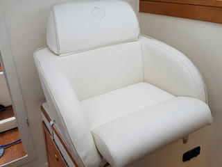 upholstered cream cockpit seat